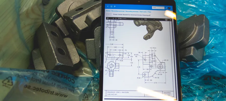 A computer tablet displaying drawings.