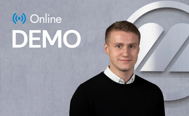 A man standing in front of a logo.