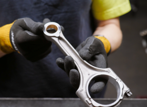 Man with a tool in a factory