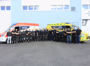 People standing outside a factory